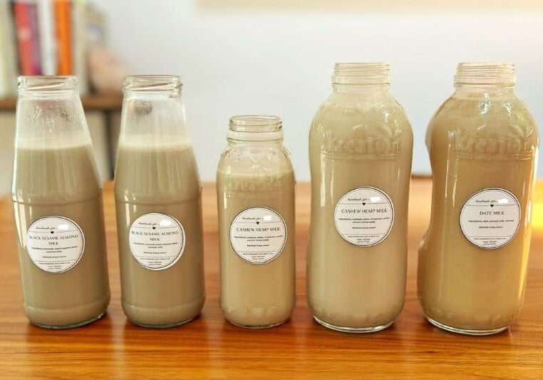 bottles of nourishing nut milk made for new moms